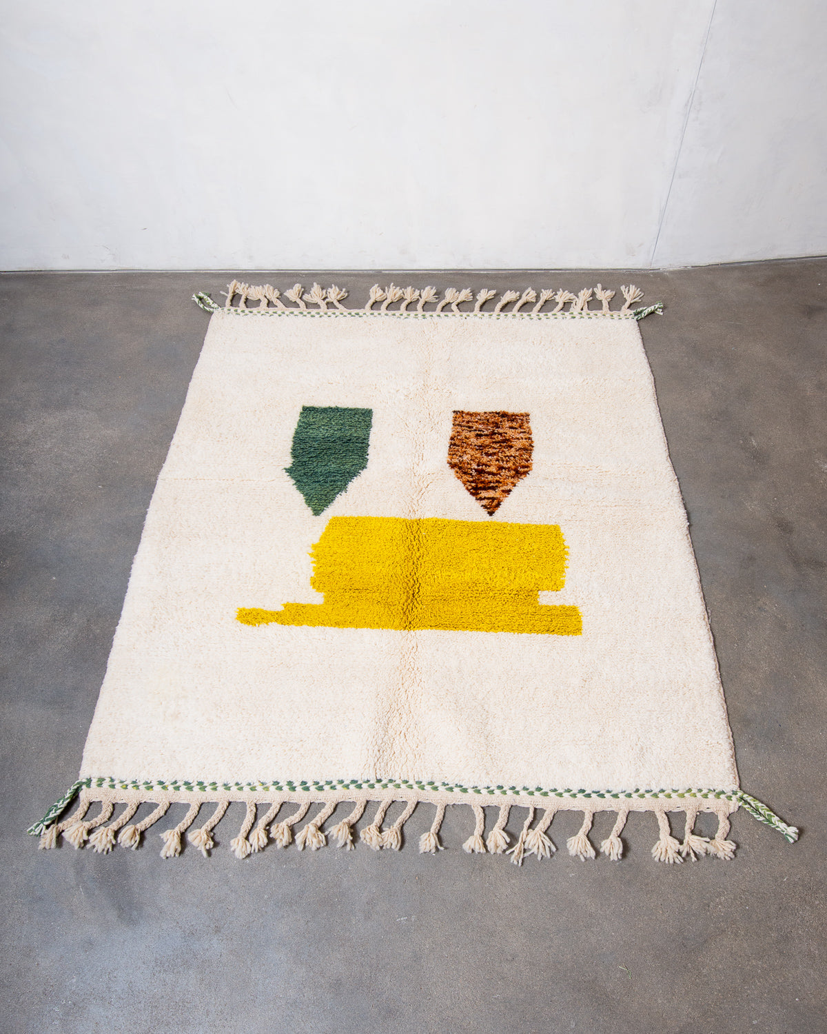Modern, designer, handcrafted Berber rug from Morocco. Beniourain carpet with beautiful colours and patterns and fluffy wool texture.